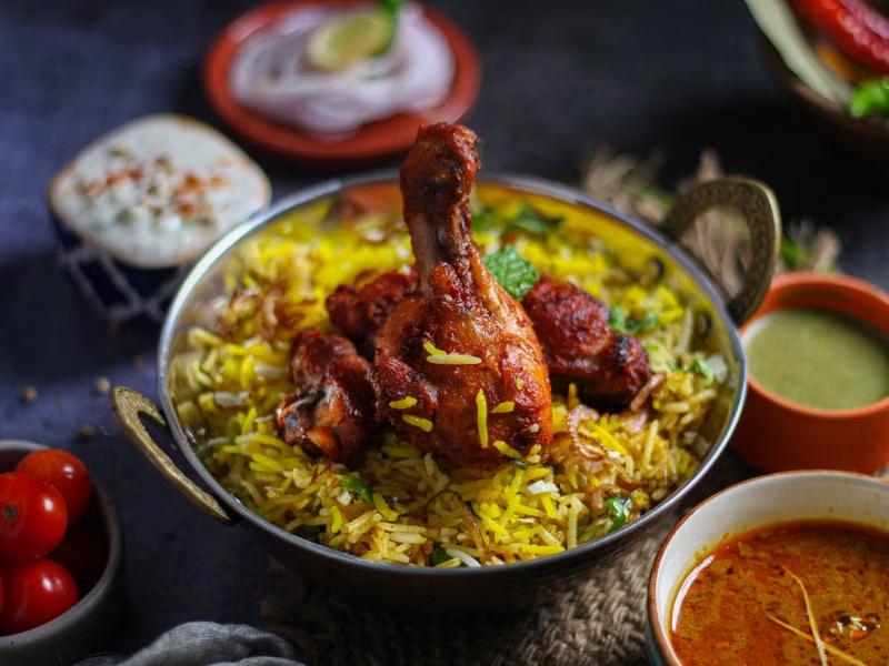 Chicken biryani in a brass bowl